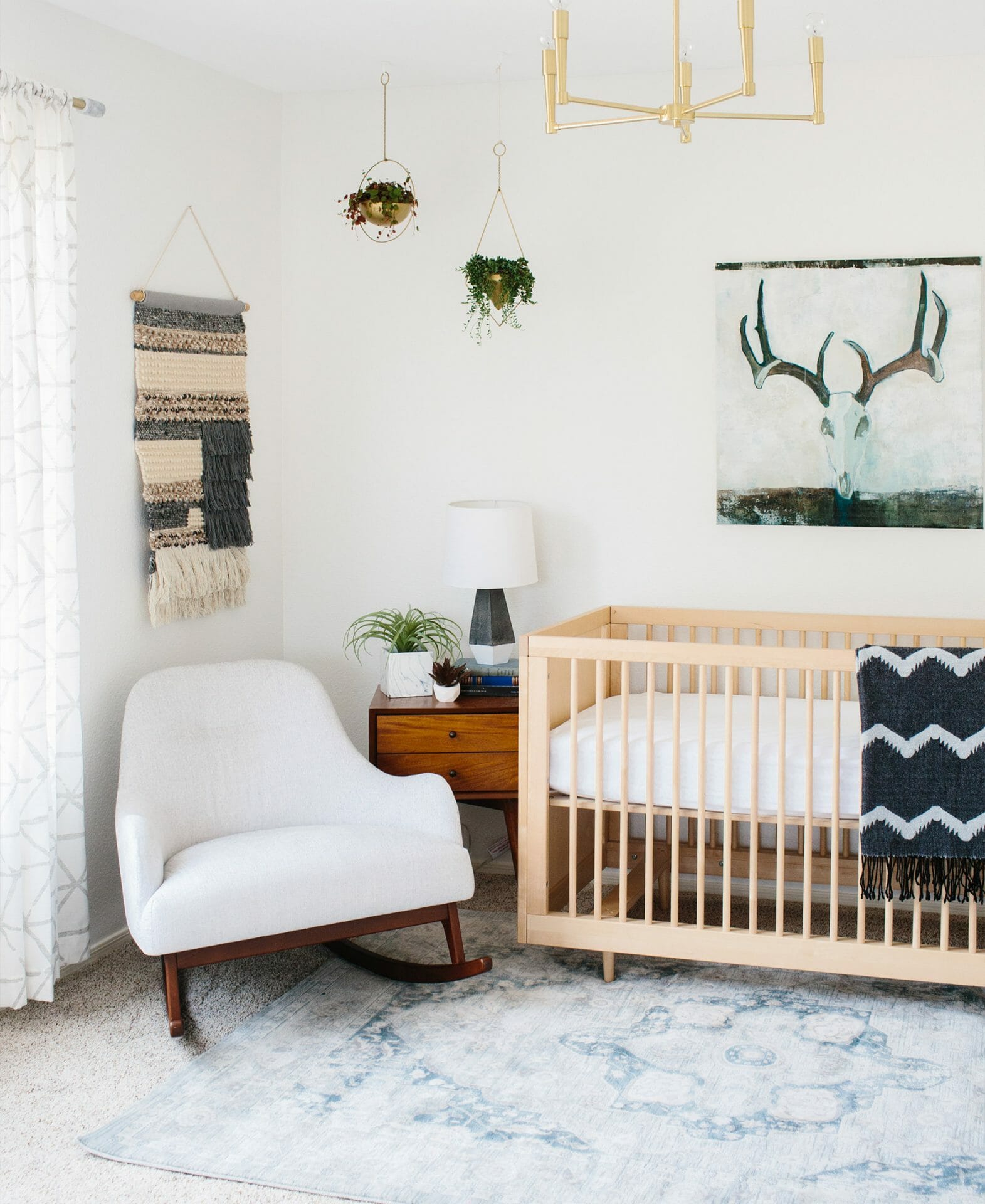 Blogger Ave Styles minimalist nursery features the Embrace Rocking Chair.
